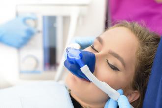 A patient is sedated prior to surgery