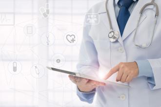 A doctor uses a tablet; to the side is a line drawing of a network with several different medical icons