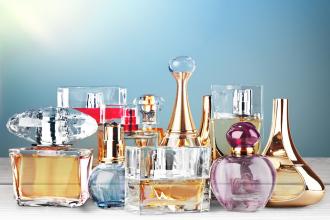 Perfume bottles on wooden table