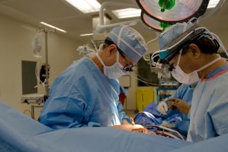 Team of surgeons doing cardiac surgery