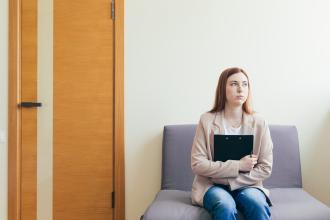 Worried woman in a doctor's waiting room