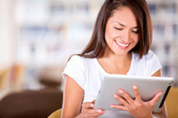 A student reads on a tablet