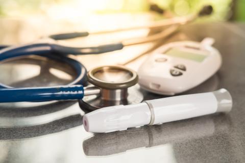 A stethoscope, a blood glucose meter, and an insulin injector