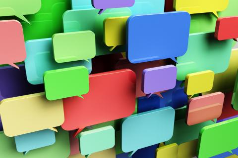 Colourful speech bubbles fill the screen.