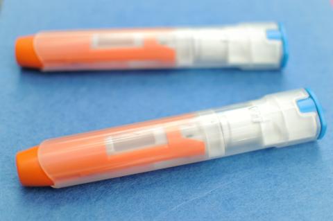 Two epinephrine auto-injectors