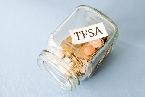 A jar of coins with the word "TFSA" on it