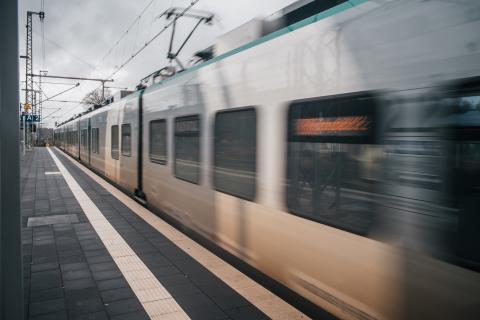 A train pulling away from a station.