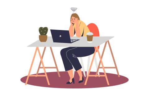 An illustration of a student sitting at a desk, staring at a computer.