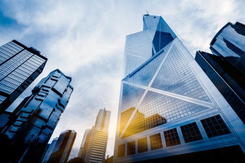 Prism-like façade of the Bank of China Tower in Hong Kong. The work of renowned architect I.M. Pei, the 70-story building's asymmetrical form has been compared to a bamboo plant, which extends its trunk successively higher with each new burst of growth. Bank of China Tower in Hong Kong