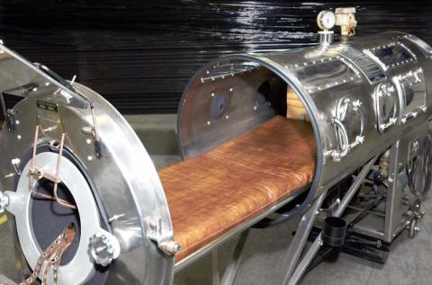 This photograph shows an opened artificial respirator commonly known as the iron lung. Polio patients of the 1950s depended on these devices to breath after being paralyzed with this virus. This iron lung was donated to the CDC. Iron lung