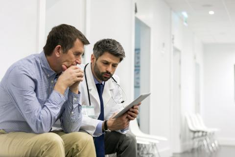 Doctor talking to a patient