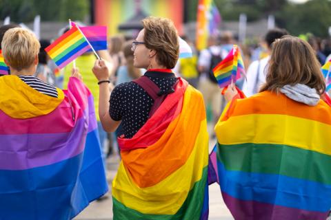 Group of people celebrating pride month at a pride event