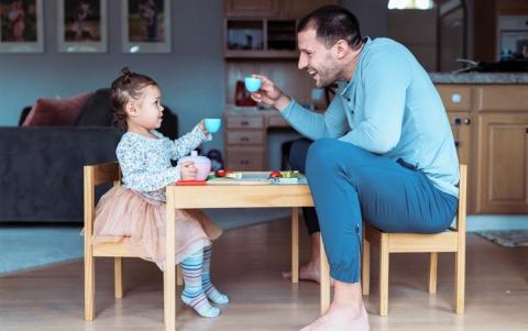 Father playing with his daughter
