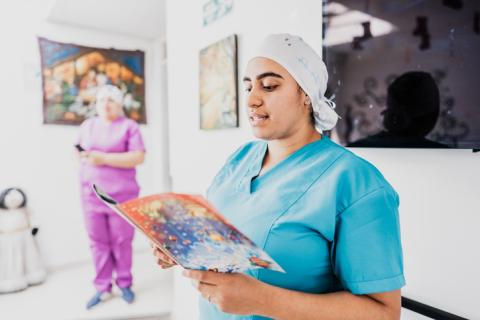 Doctor reading a magazine