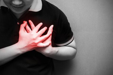 A man with severe heartache, suffering from chest pain
