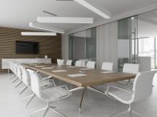A boardroom table in a modern office