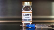 A vial of fentanyl and a syringe.