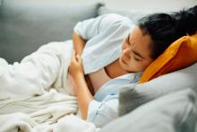 Young woman experiencing menstrual pain