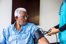 Taking blood pressure to monitor hypertension